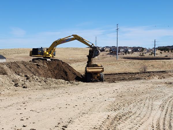 SMH West excavator working a grading site